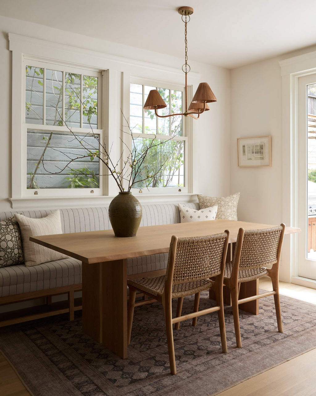 Marin Dining Chair with teak frame and weatherproof faux rattan weave for indoor and outdoor use