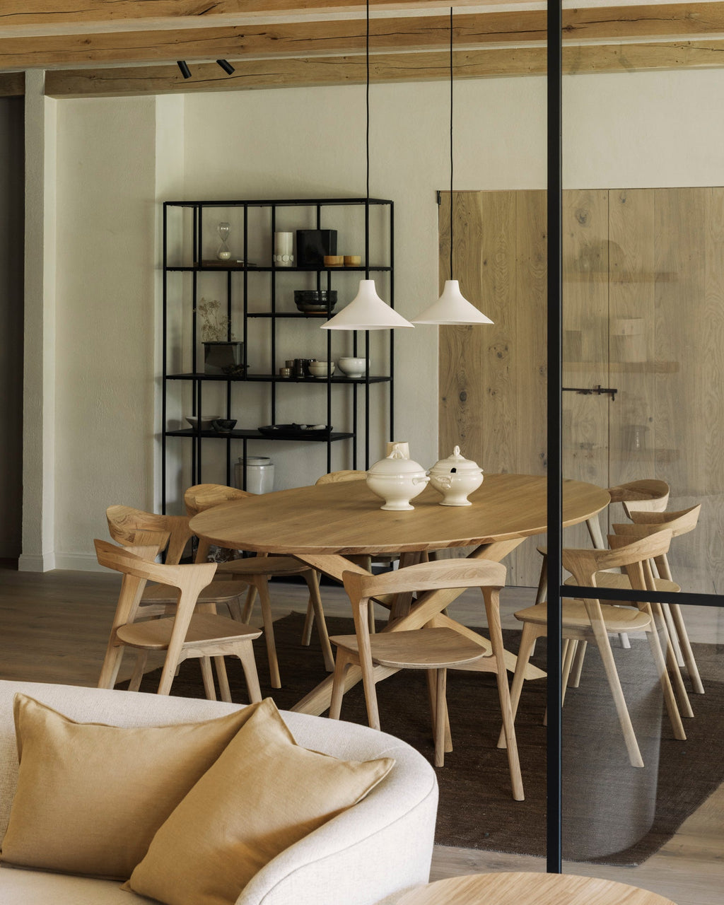 Mikado Oval Dining Table in white oak with sculptural interlocking legs and smooth oval top