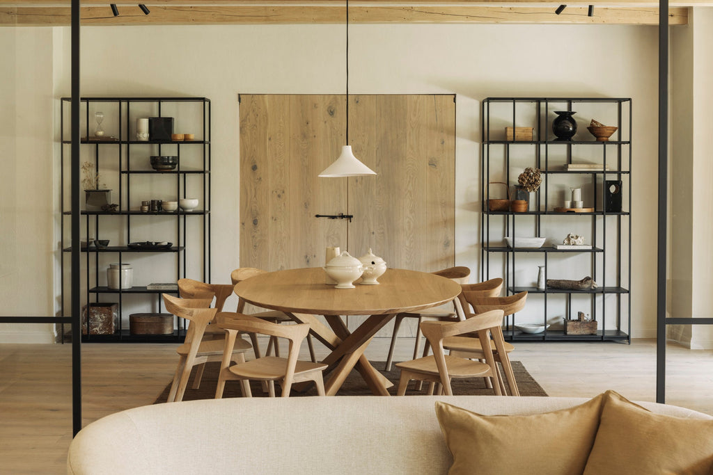 Mikado Oval Dining Table in white oak with sculptural interlocking legs and smooth oval top