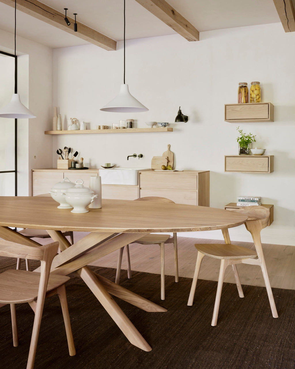 Mikado Oval Dining Table in white oak with interlocking branch-inspired legs and oval top, modern organic design