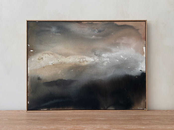 White Oak framed abstract painting on a wooden surface with a neutral background