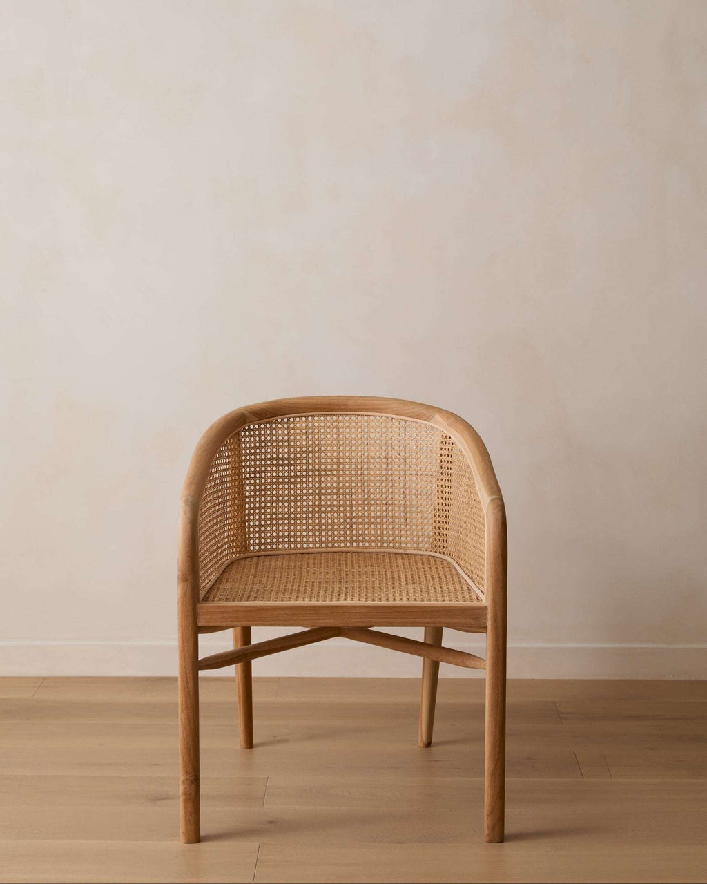 Olivia Rattan Accent Chair handcrafted from teak with woven rattan open-weave design