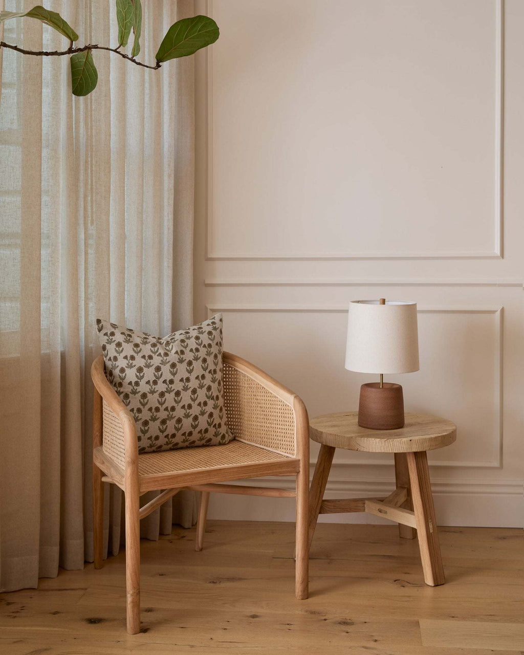 Olivia Rattan Accent Chair handcrafted from teak and woven rattan with open-weave design and natural finish