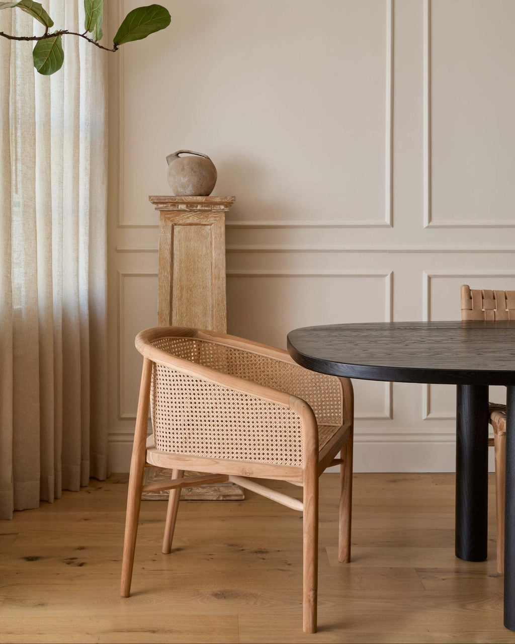 Olivia Rattan Accent Chair handcrafted from teak with open-weave design for stylish, natural seating