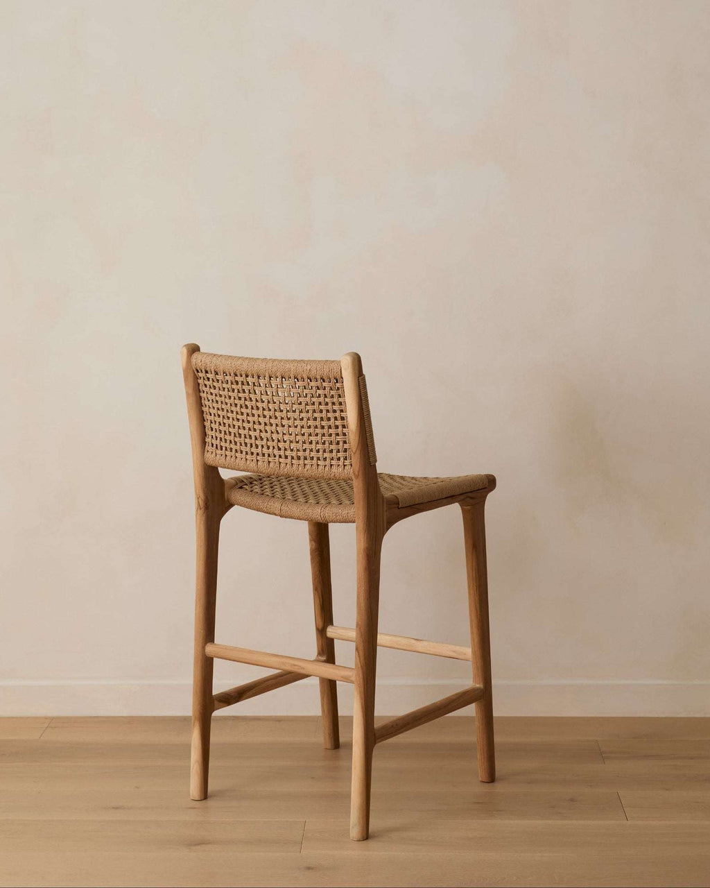 Paper Cord Counter Stool with handwoven paper cord seat and teak wood frame, showcasing natural texture and craftsmanship