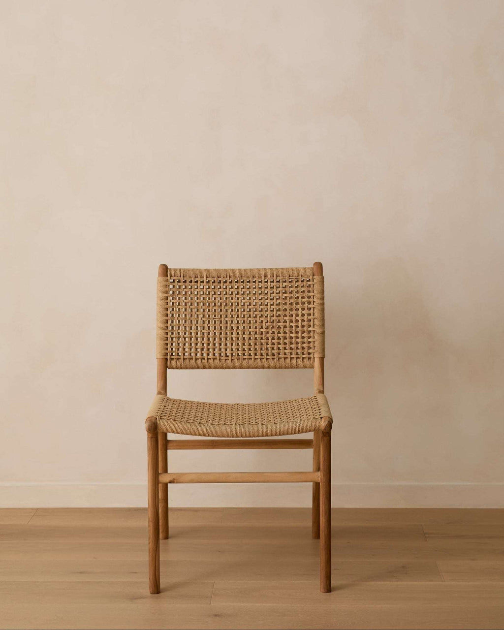 Paper Cord Dining Chair with handwoven seat and teak frame showcasing natural texture and craftsmanship