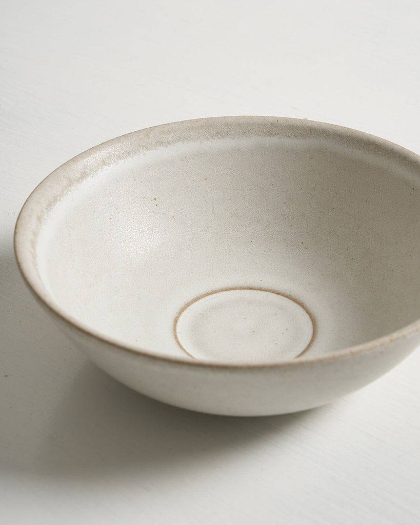 White ceramic Pillar low small bowl on a light gray background