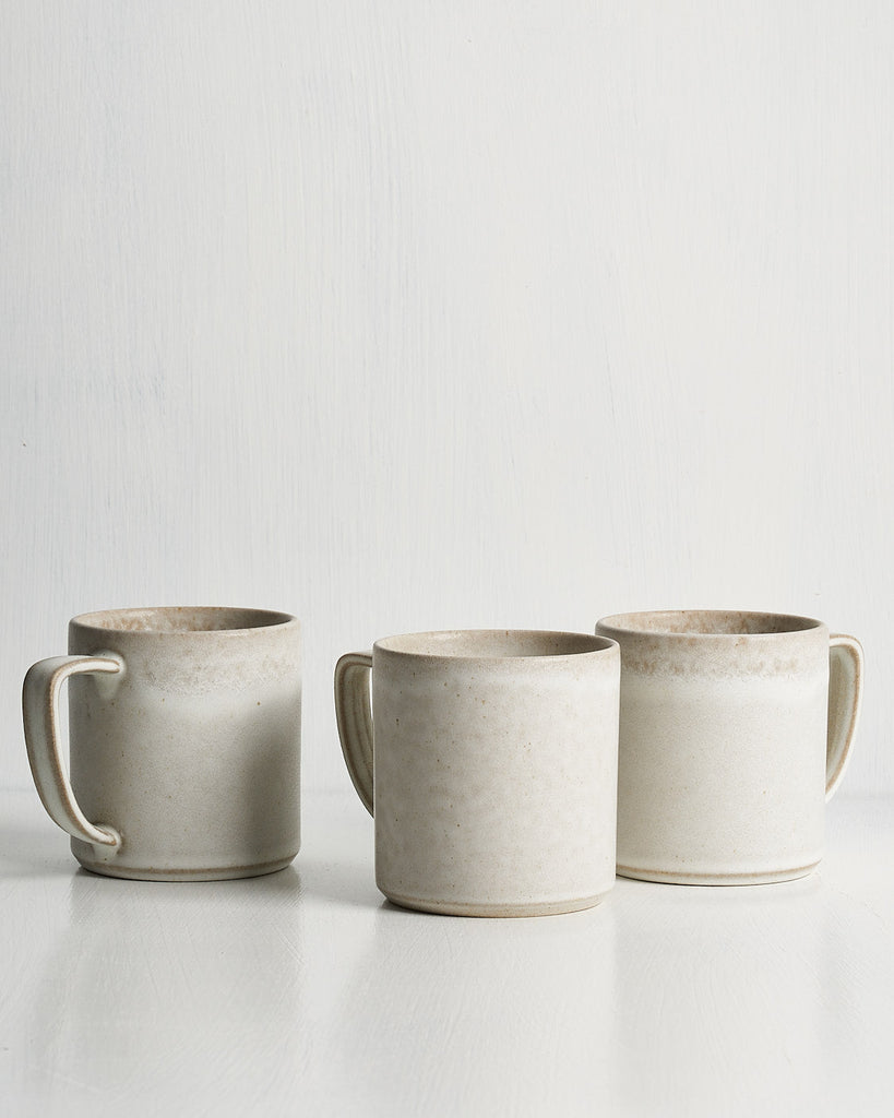 Three ceramic Pillar mugs on a white background
