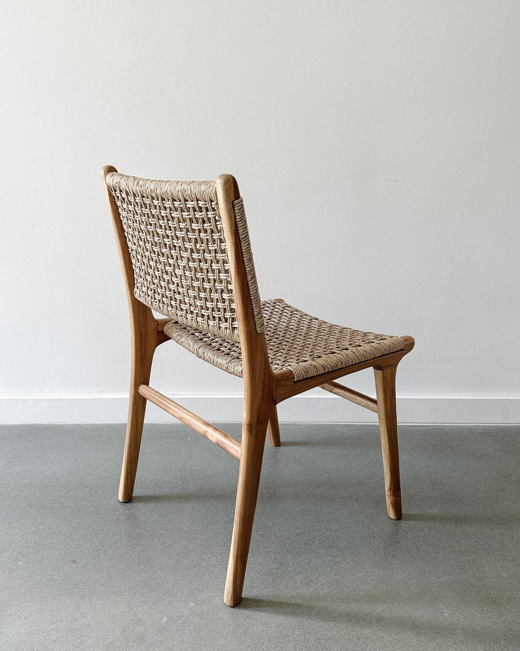 Marin Dining Chair with teak frame and weatherproof faux rattan weave for indoor and outdoor use