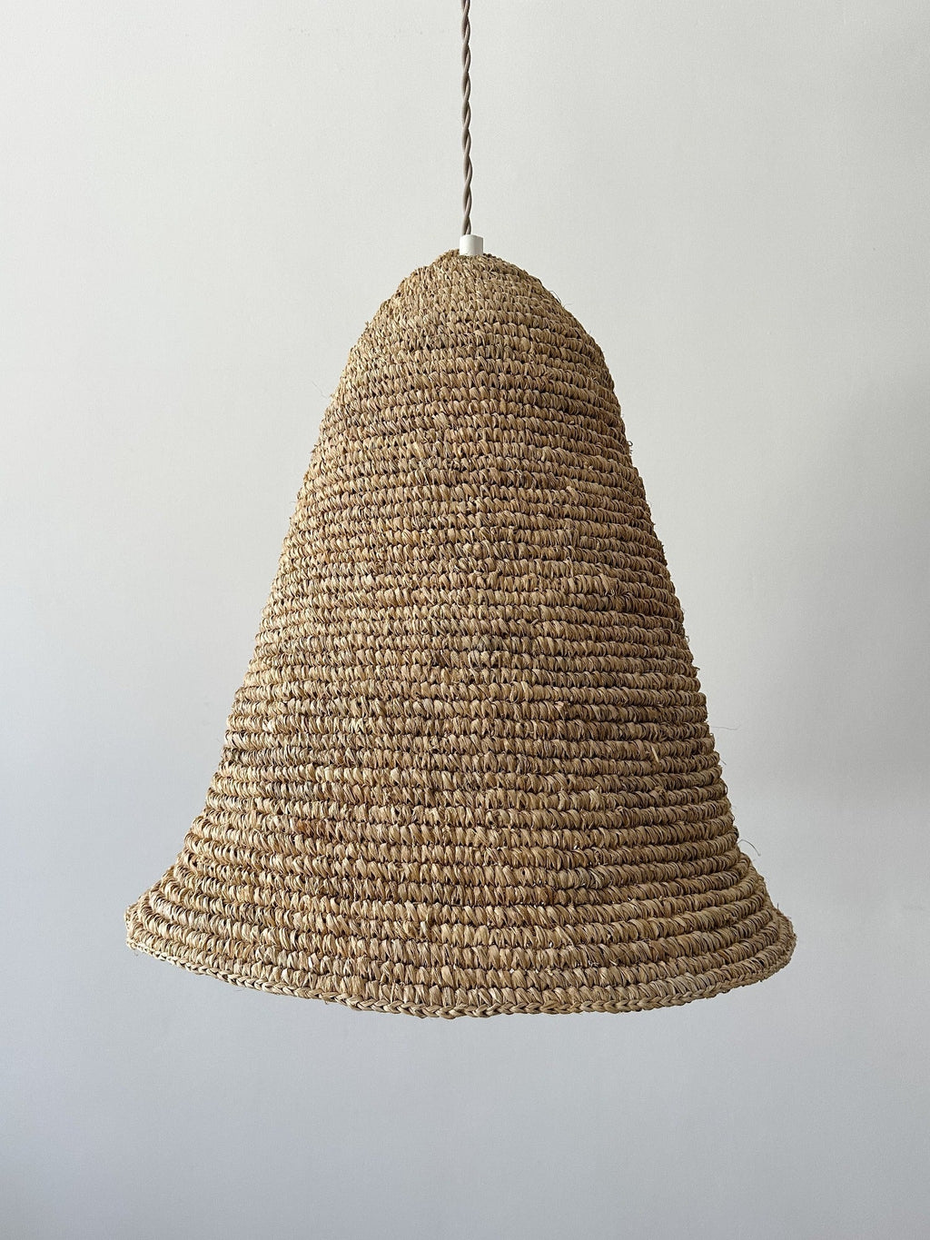 Handwoven Bali Bell Pendant made of water hyacinth with twisted fabric cord and antique brass fittings