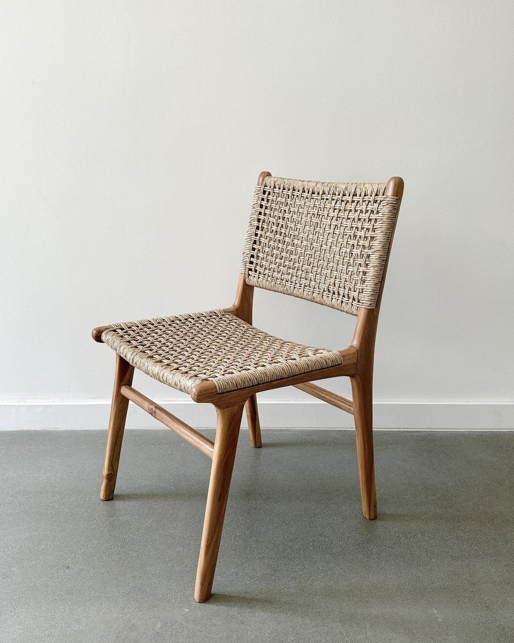Marin Dining Chair with teak frame and weatherproof faux rattan weave for indoor and outdoor use
