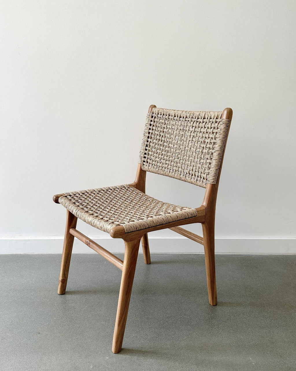 Marin Dining Chair with teak frame and faux rattan weave, second quality and weatherproof design