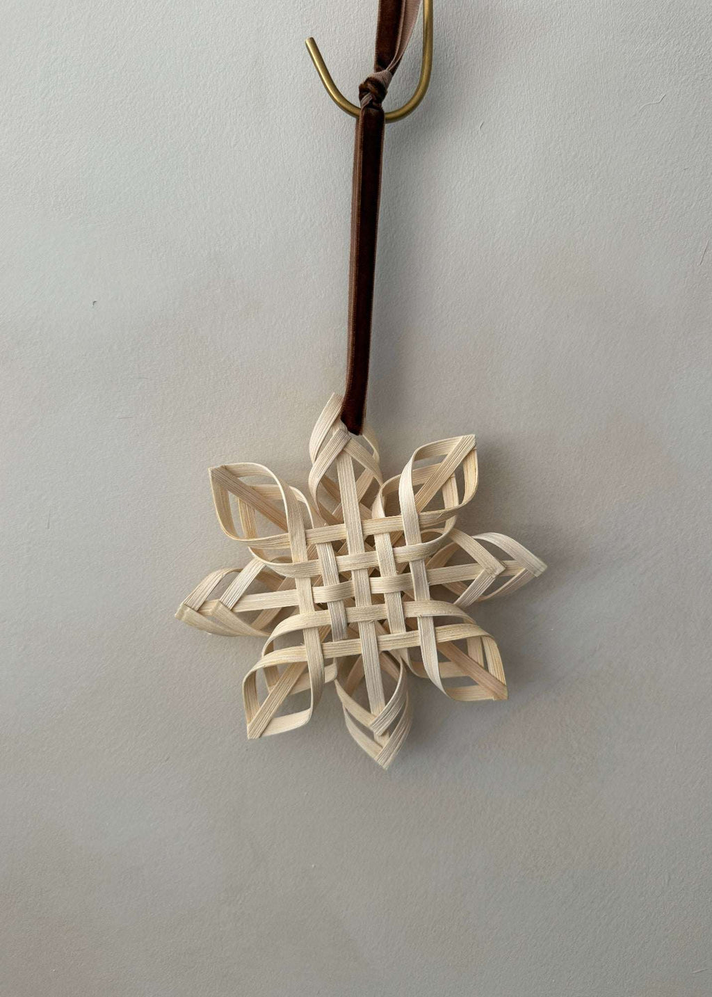 Handcrafted Rattan Star Ornament and Tree Topper made from natural lightweight rattan reed for holiday decor