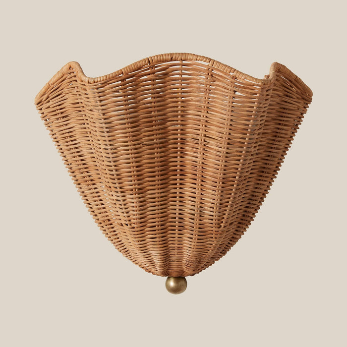 Wicker Ravello wall sconce on a beige background