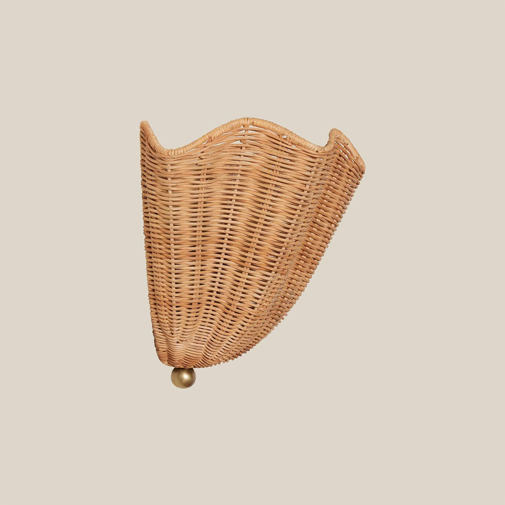 Wicker Ravello wall sconce on a beige background