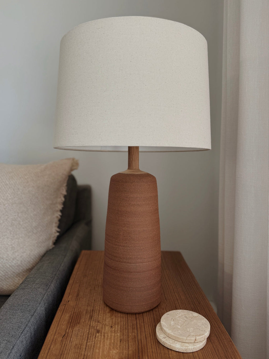 Ravello Ceramic Table Lamp in terracotta with ribbed ceramic base, wood neck, linen shade, and built-in dimmer switch