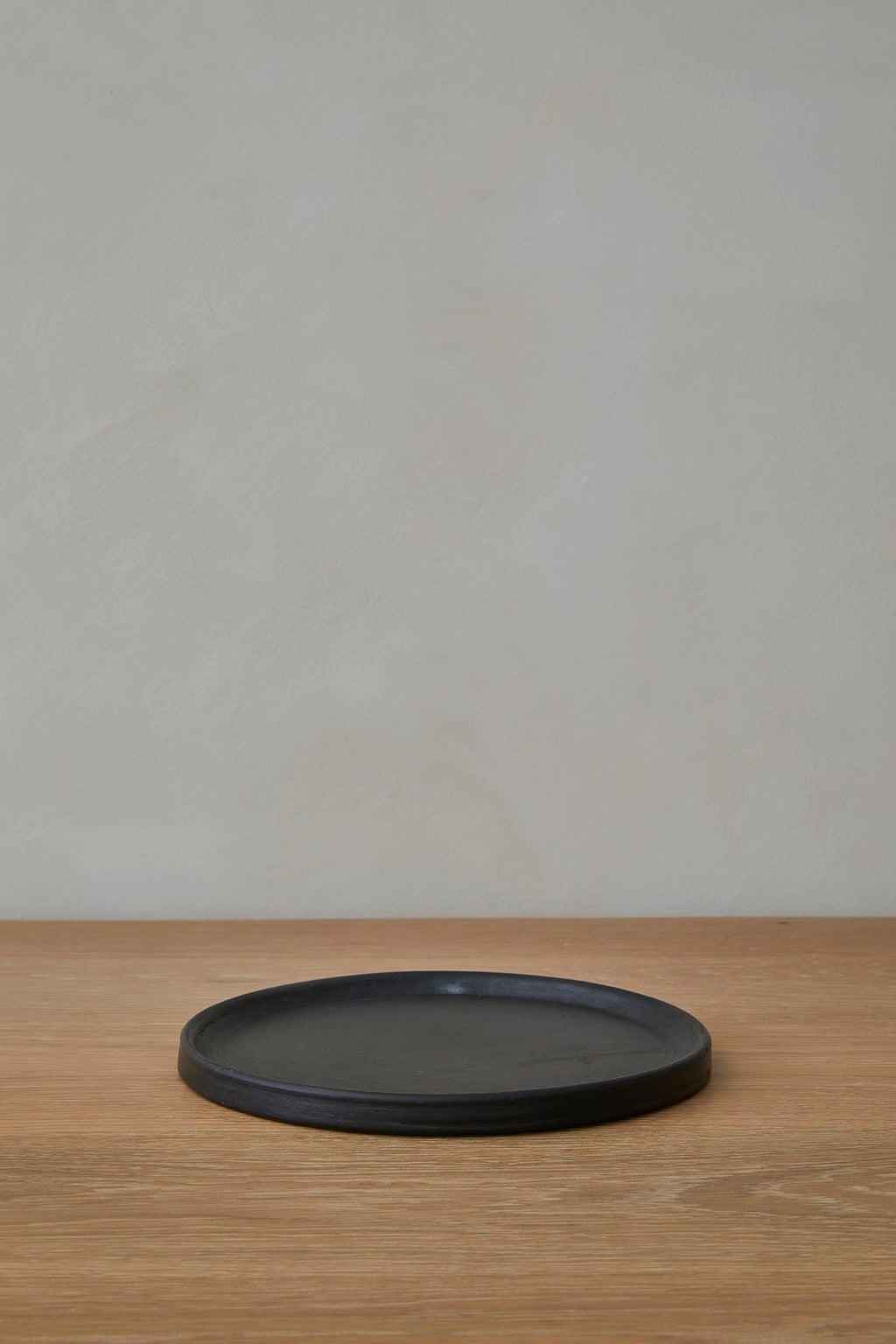 Oaxacan Handmade Ceramic Salad Plate in black with rustic, artisanal design