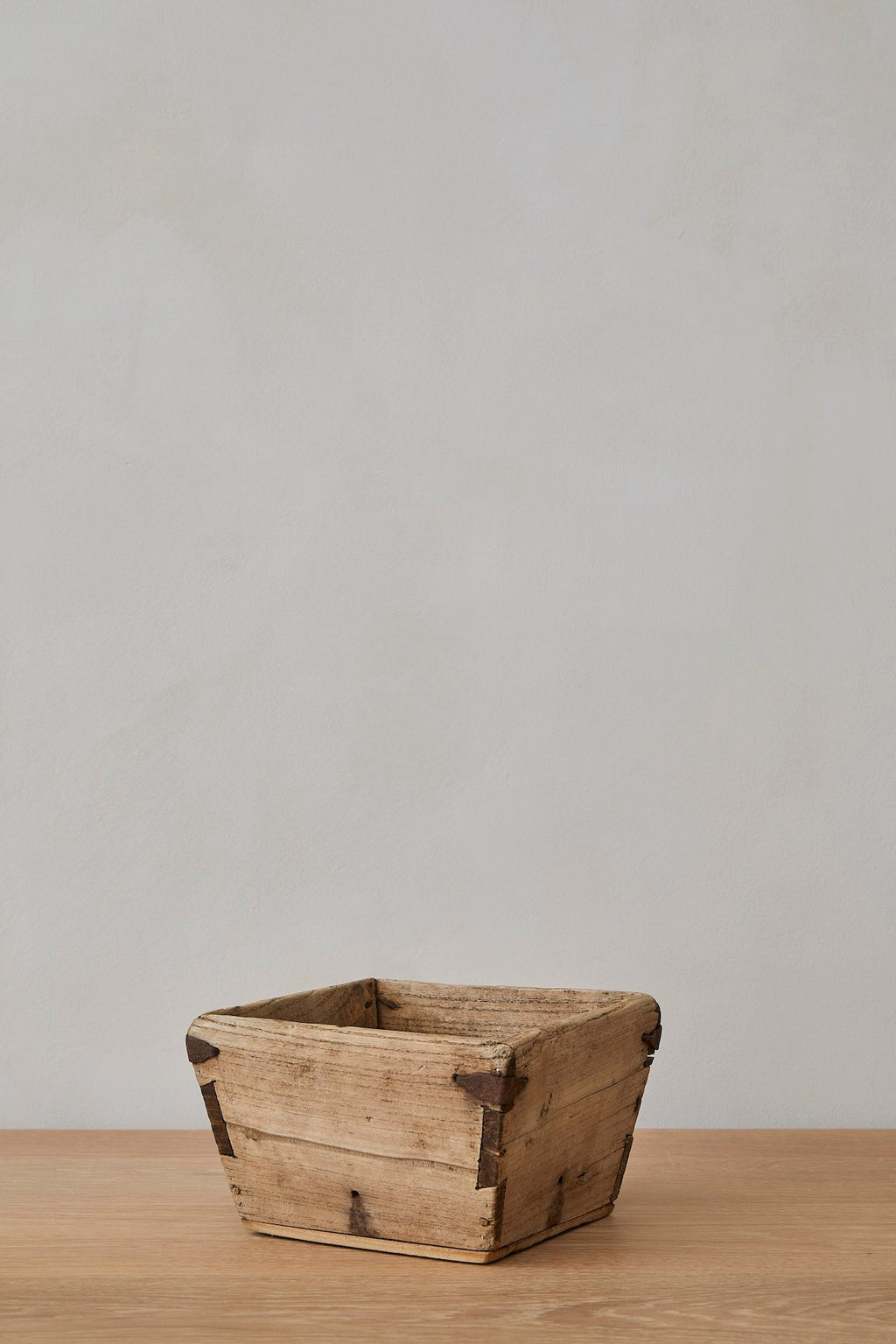 Handcrafted vintage rice box with traditional joinery showing aged wood texture and rustic charm