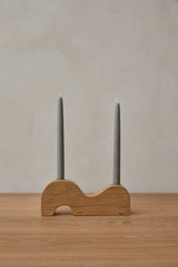 Wave Candlestick Holder made of white oak with brass accents and organic design