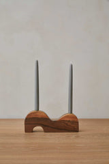 Wave Candlestick Holder made from black walnut wood with brass accents and sculptural design