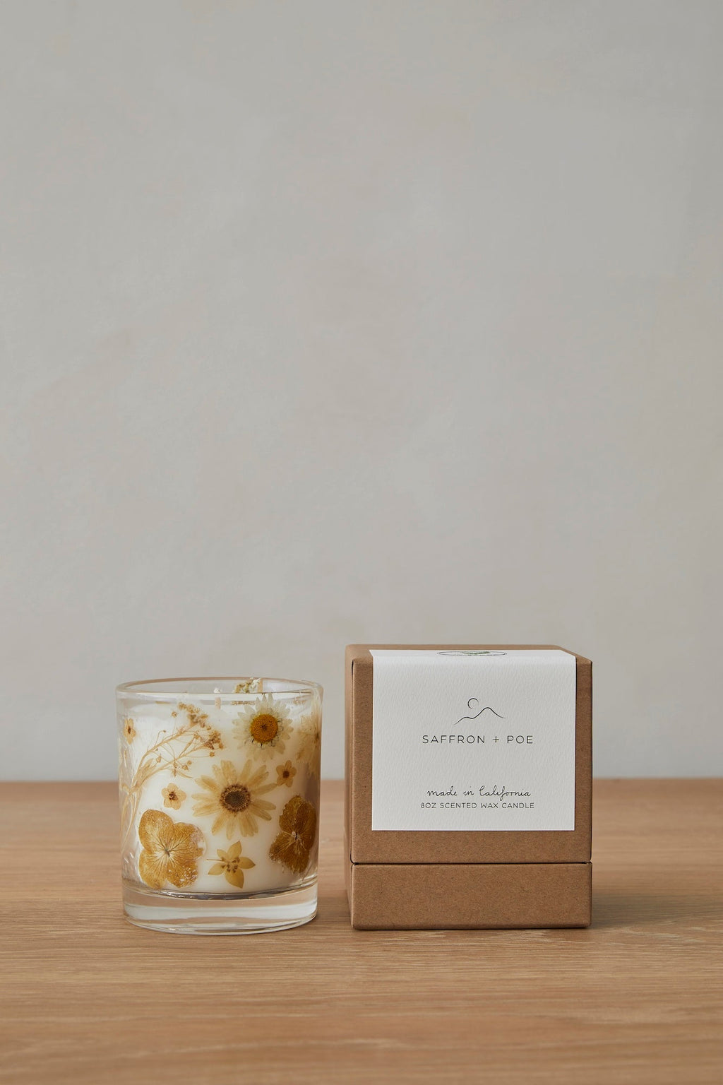 In Bloom Candle with floral design and fresh gardenia scent by Saffron + Poe