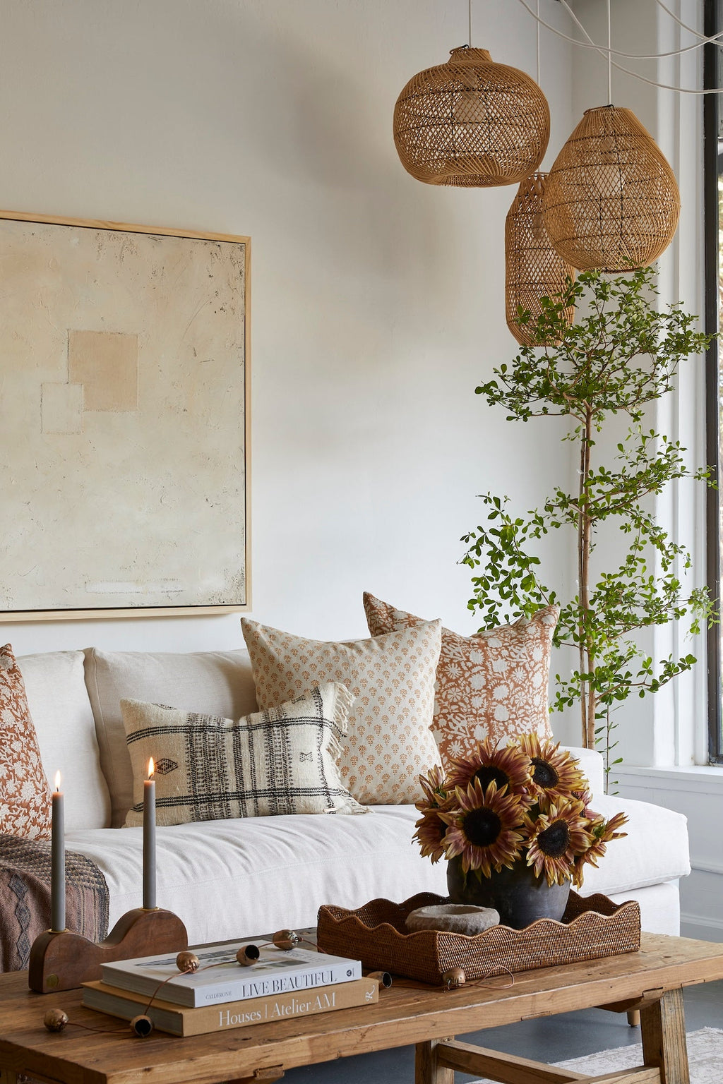 Indian Blockprint Pillow with hand-block-printed linen fabric and neutral intricate design on sofa