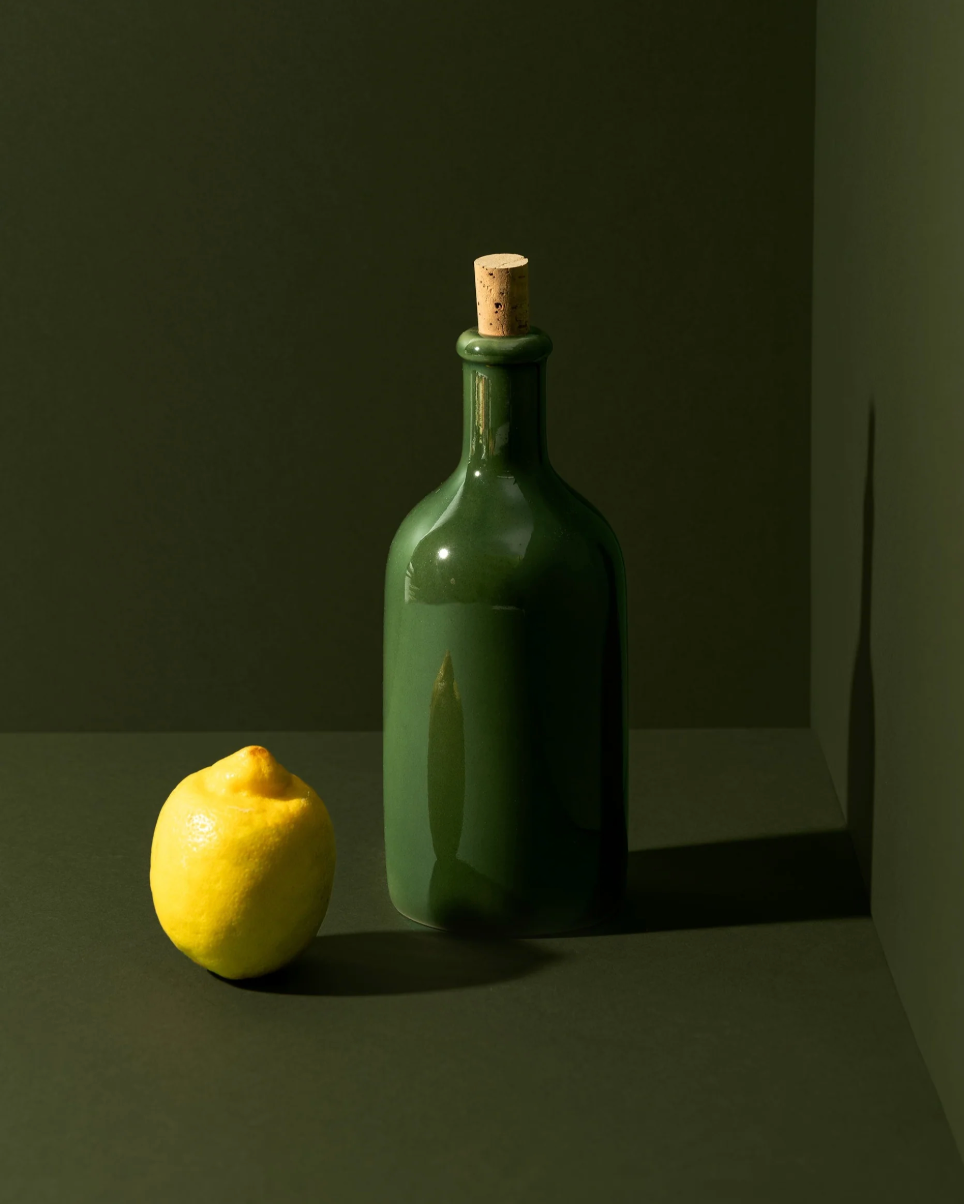 Handmade stoneware olive oil dispenser with matte finish, crafted by Tunisian artisans