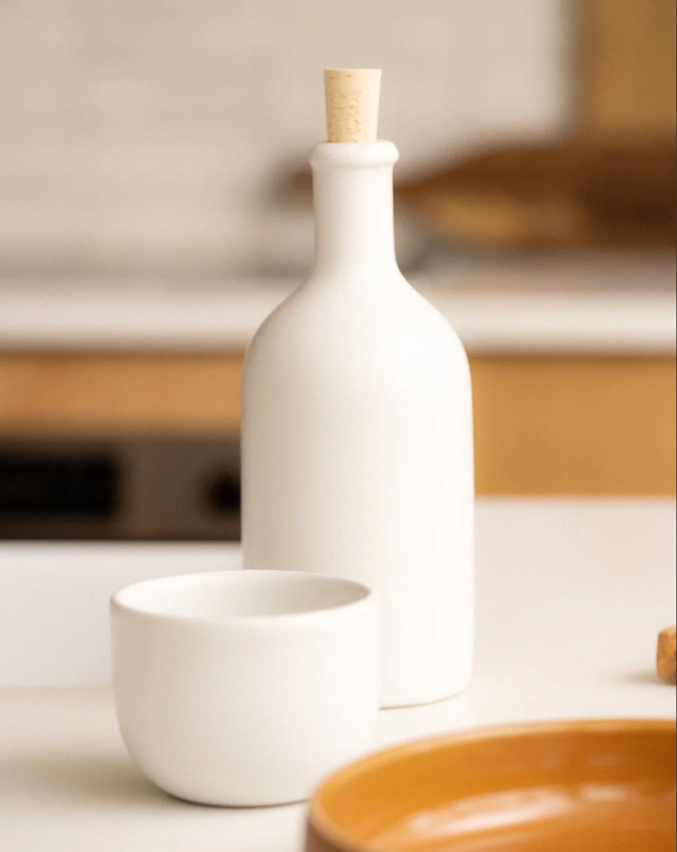 Handmade stoneware olive oil dispenser with matte finish from Tunisia, 8 inches tall