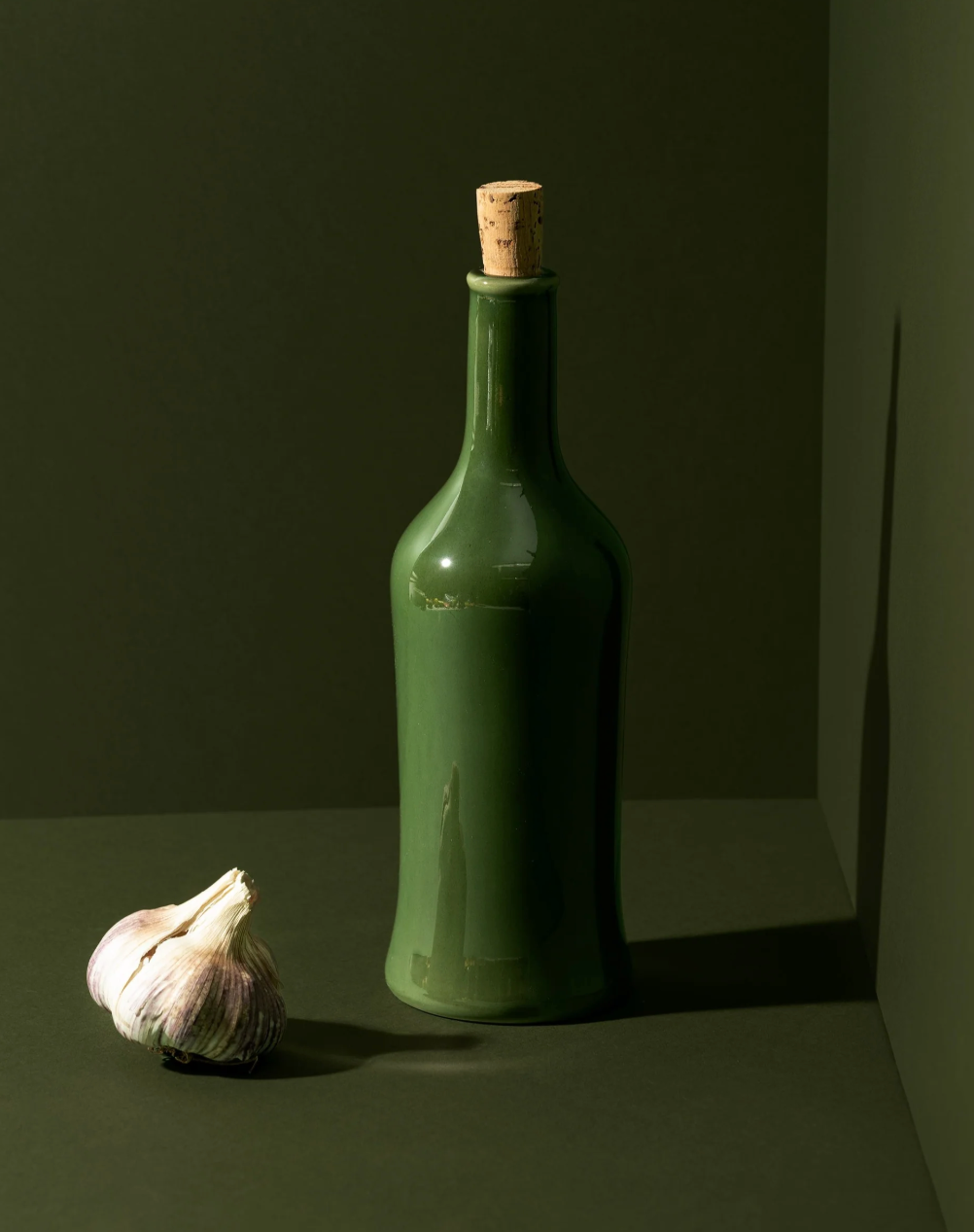 Handcrafted stoneware olive oil dispenser with matte glaze, inspired by Tunisian tradition and coastal design.