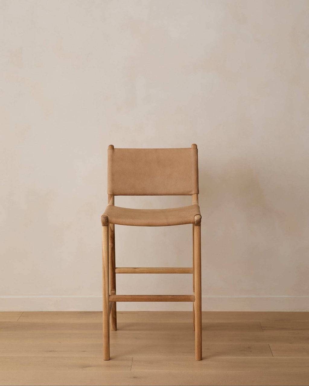 Beige Sofia Counter Stool with leather ties and teak wood frame