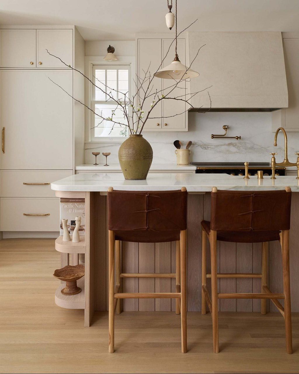 Sofia Counter Stool in saddle leather with Javanese teak wood and elegant leather ties