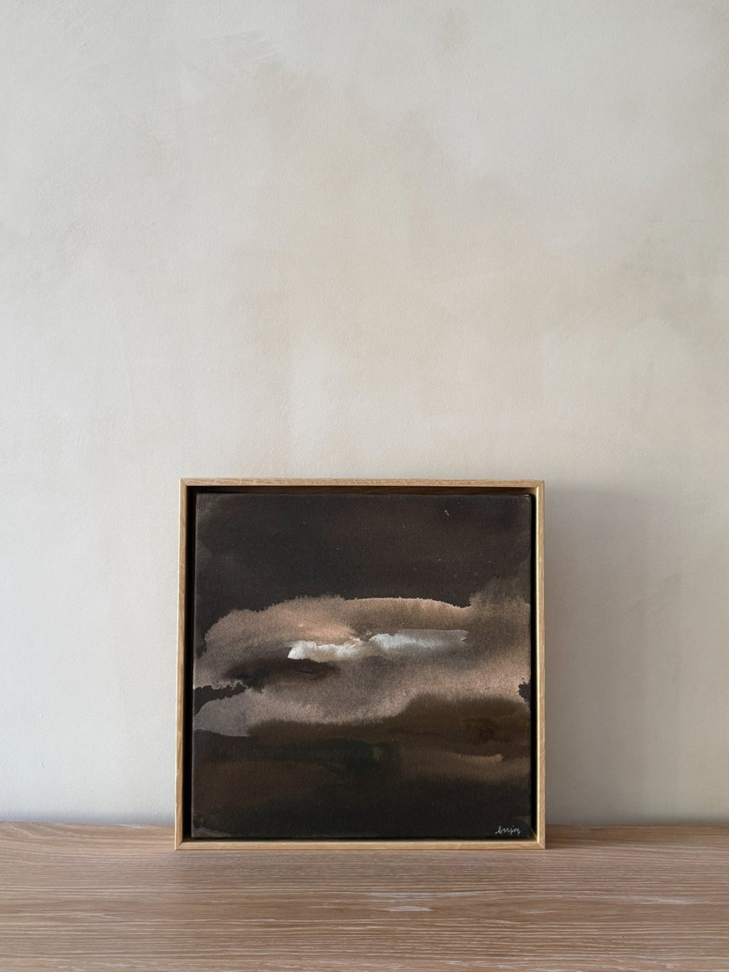 Dusk landscape painting with moody browns and pale light on raw canvas in natural wood frame