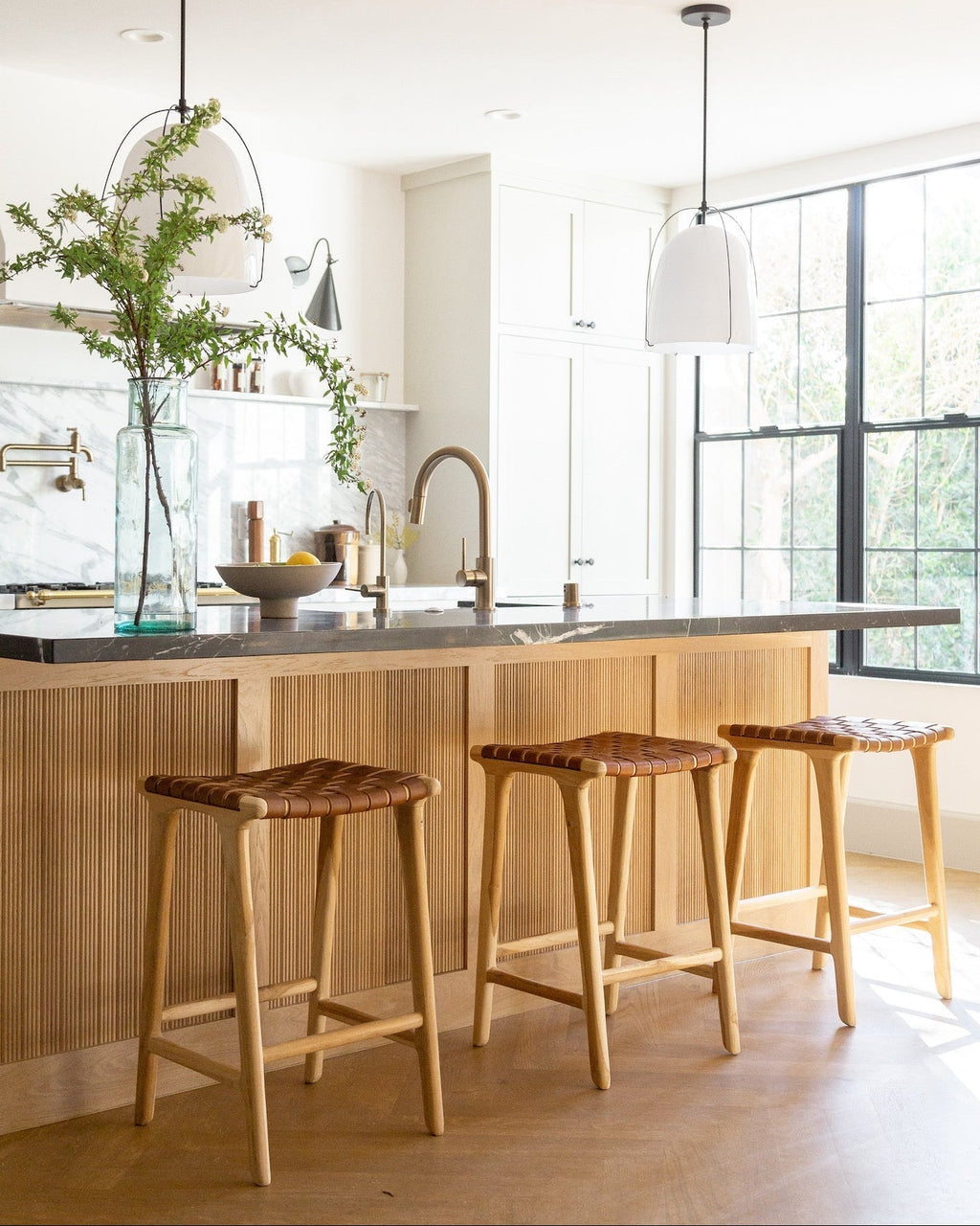 Backless woven leather counter stool in saddle color with teak frame, handmade in Bali, second quality with natural leather and wood variations