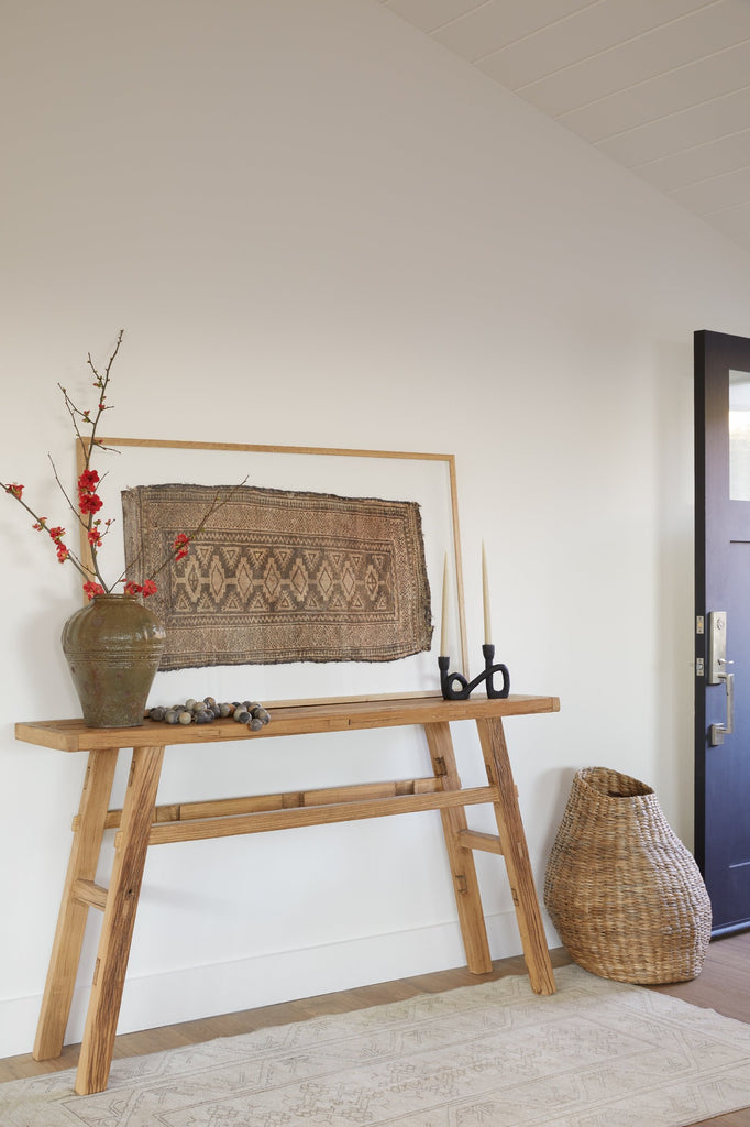 Sculptural Nest Basket styled in an entryway setting with Vintage Console and Vintage Mijiu Jar. - Saffron and Poe