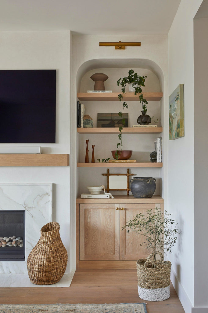 Styled view of Structured Hyacinth Storage Basket with a plant. - Saffron and Poe