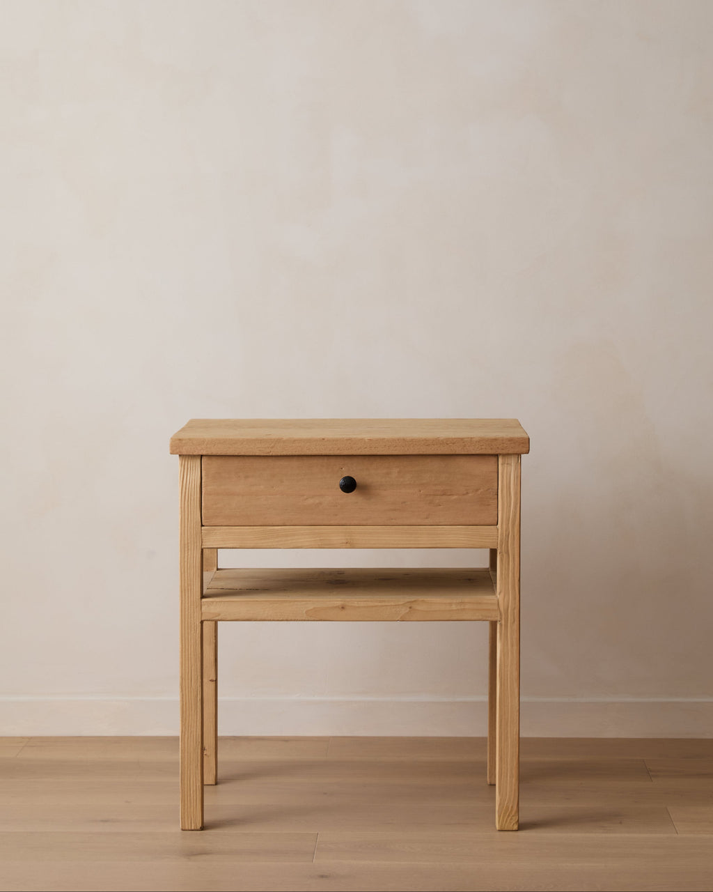 Vintage cypress bedside table made from reclaimed wood with a single drawer and bronze knob