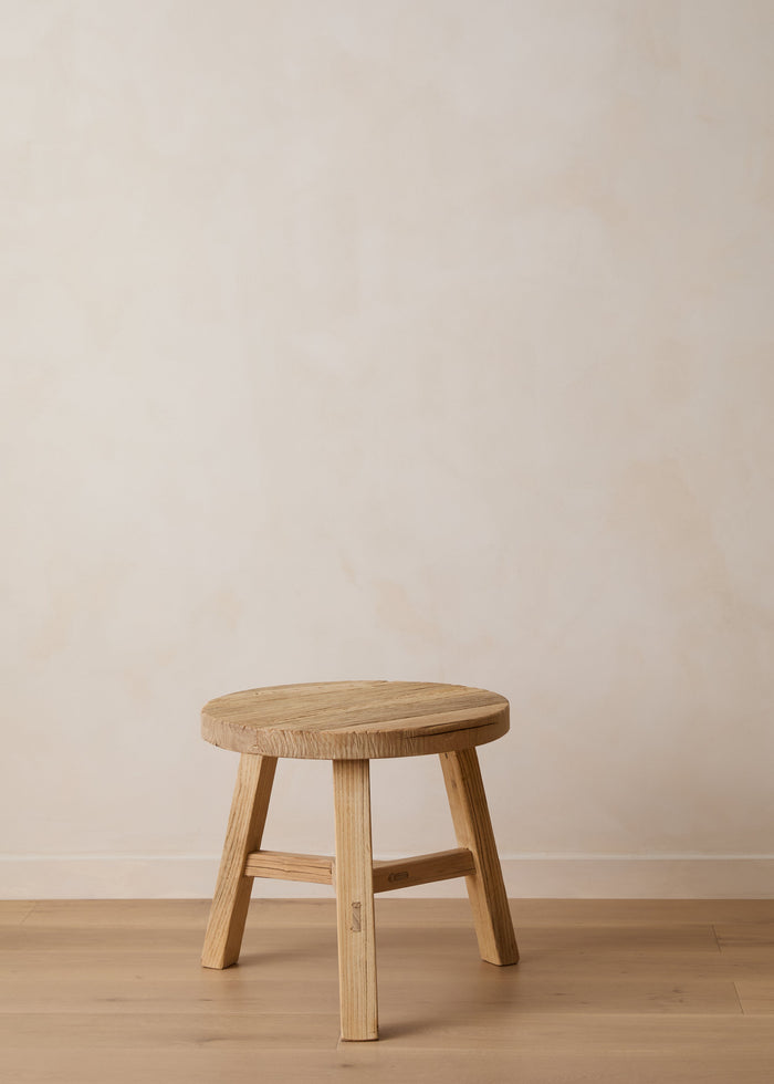 Vintage round side table handcrafted from reclaimed elmwood with rustic patina and traditional Chinese craftsmanship