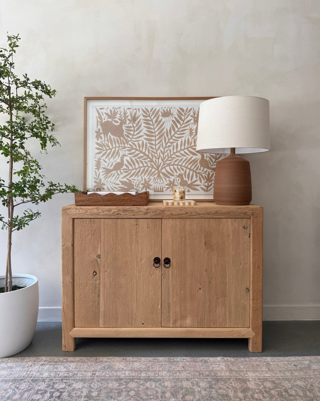 Vintage cypress cabinet made from reclaimed wood with minimalist design and natural finish