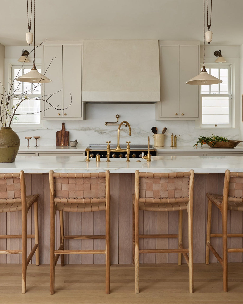 Beige woven leather counter stool with handwoven straps and teak wood frame, showing natural texture and artisanal craftsmanship