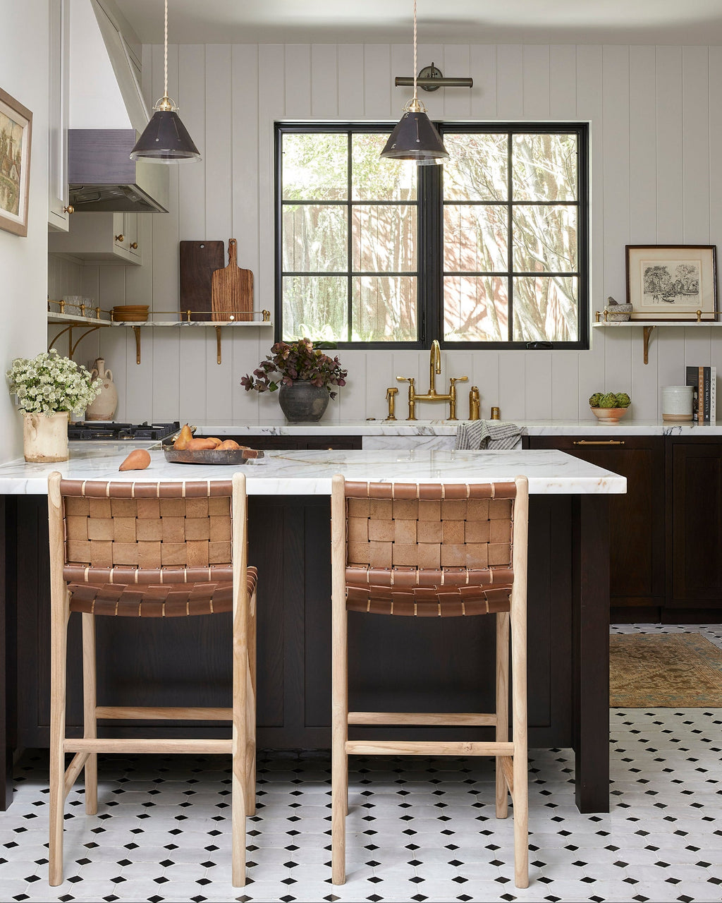 Woven leather counter stool in saddle color with teak frame and woven straps