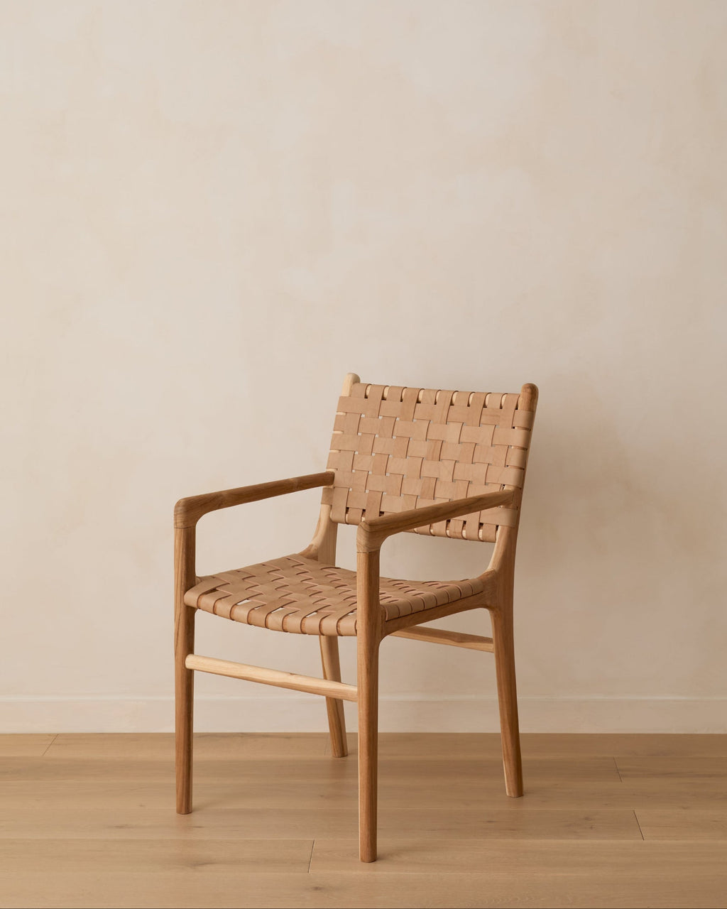 Beige woven leather dining arm chair with teak wood frame, handcrafted in Bali, second quality with minor imperfections