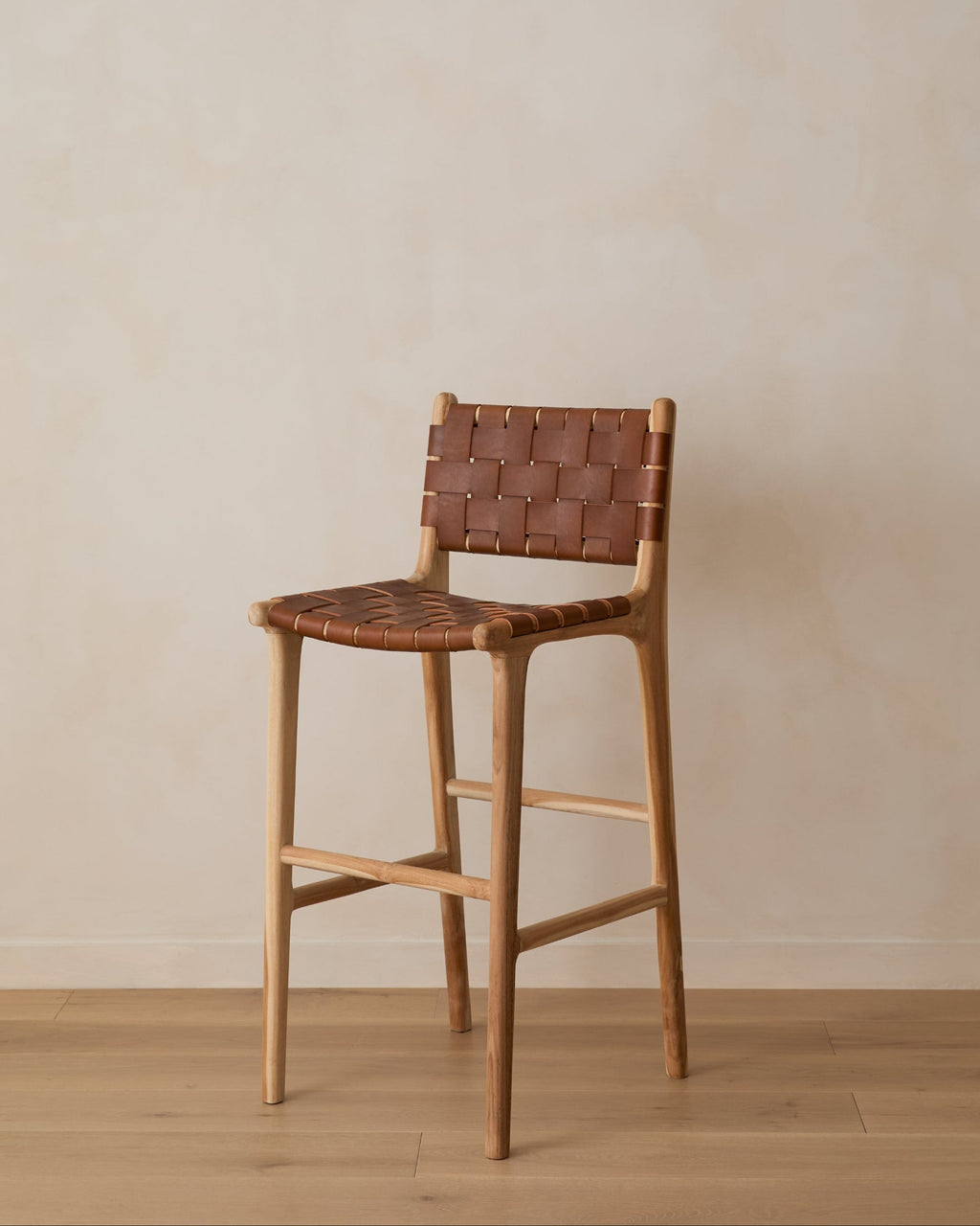 Woven leather bar stool in saddle color with teak frame, second quality, handcrafted and versatile design