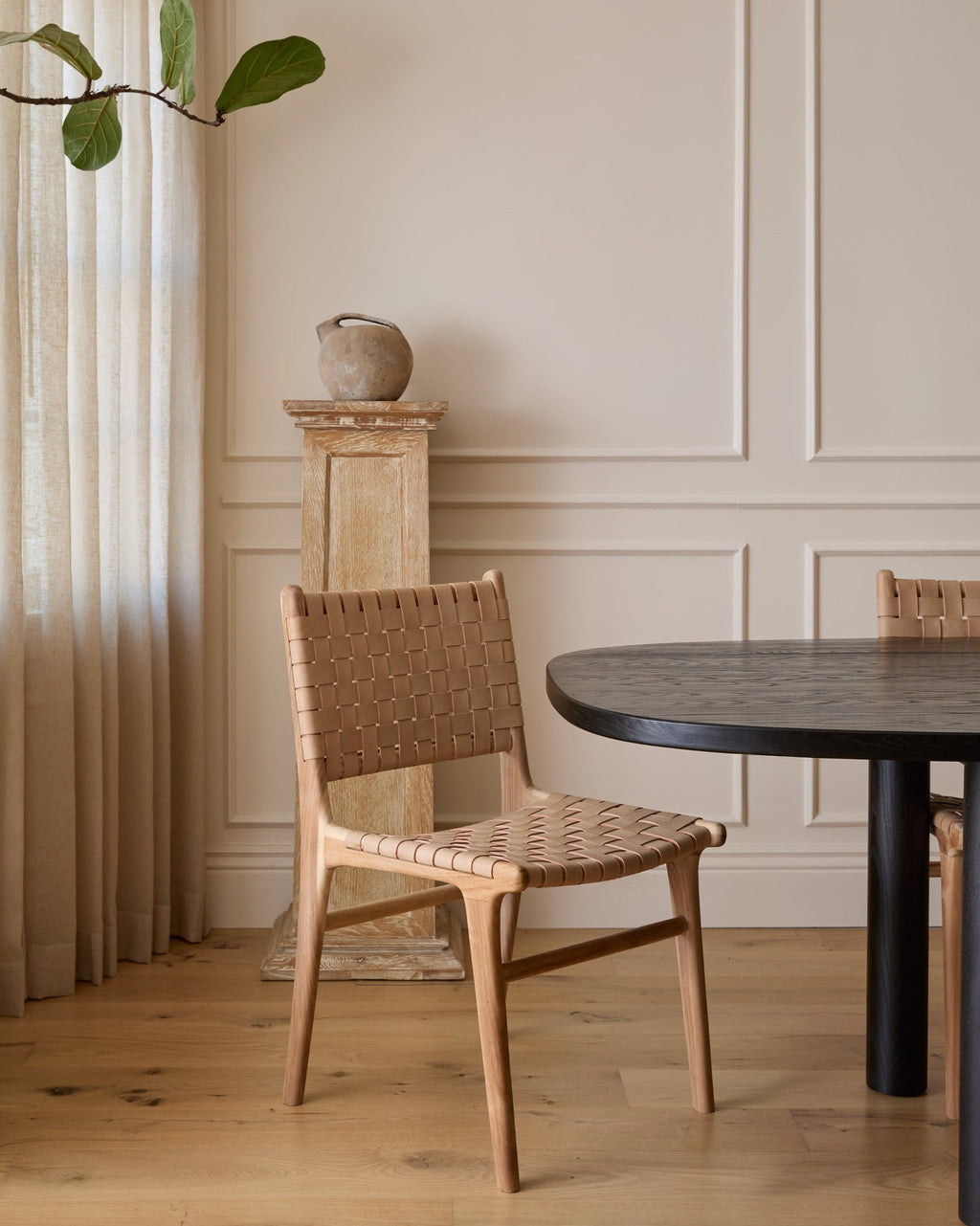 Beige woven leather dining chair with teak wood frame, handcrafted in Bali, second quality with natural leather variations