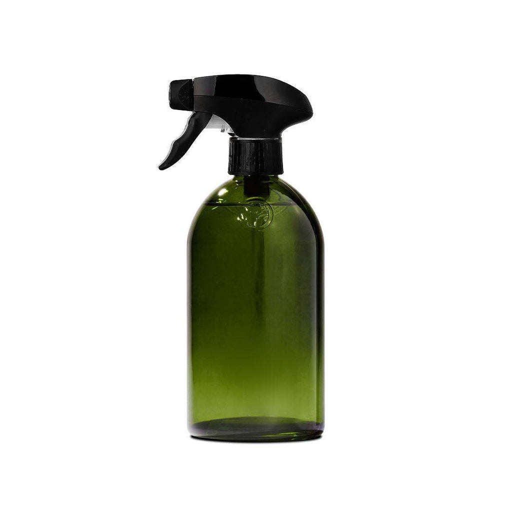Apothecary Glass Bottle in dark green glass with a black spray trigger and classic rounded shape