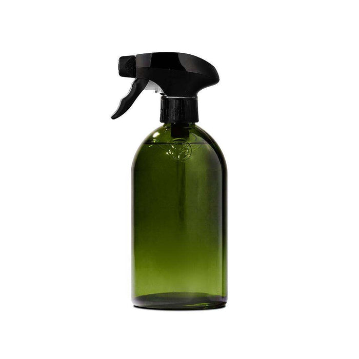 Apothecary Glass Bottle in dark green glass with a black spray trigger and classic rounded shape