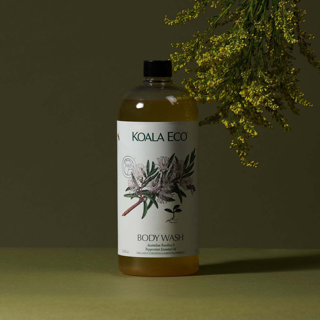 Body Wash - Rosalina & Peppermint in an amber bottle with a black cap and white botanical label