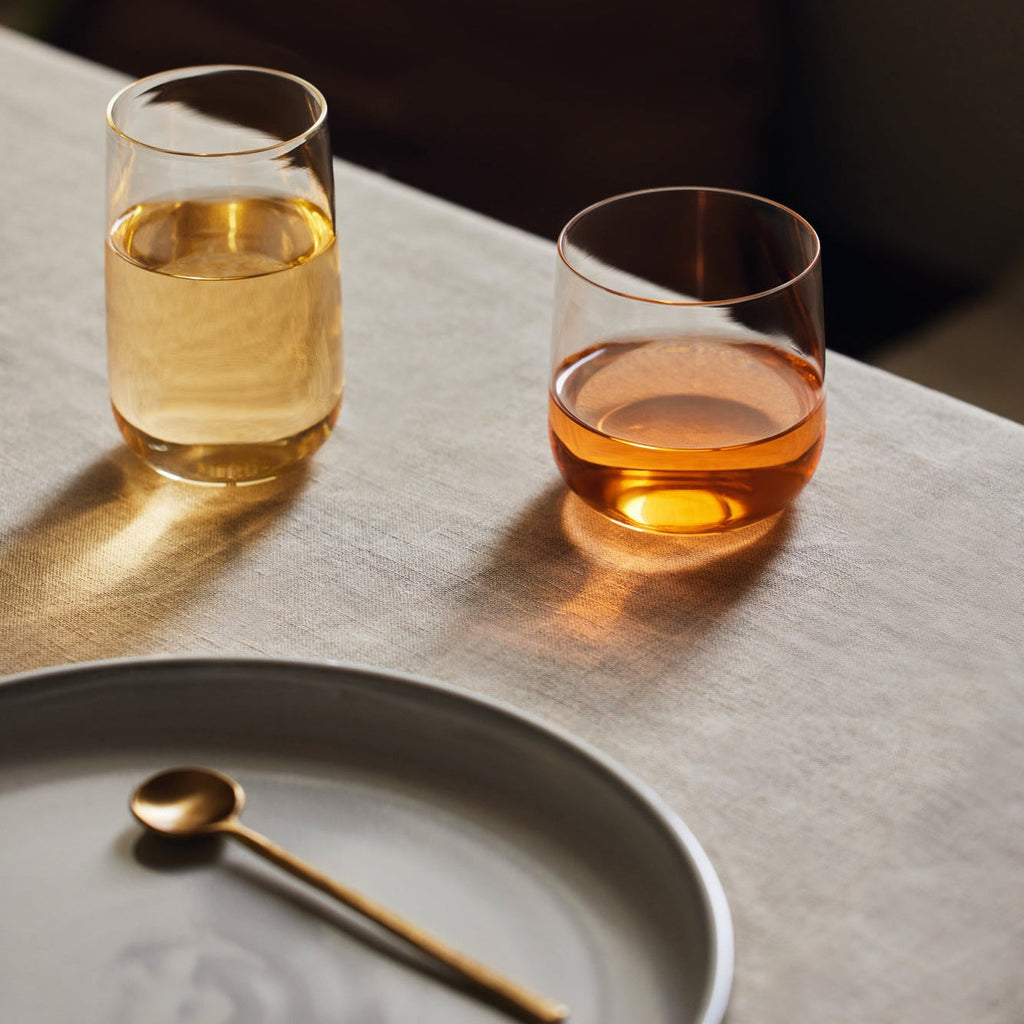 Set of 4 tall Cremini tumblers made of durable borosilicate glass, hand-blown and thermal shock proof, ideal for everyday use.