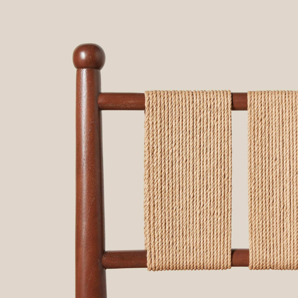 Estela Counter Stool with warm brown solid wood frame and tightly woven natural rope back detail