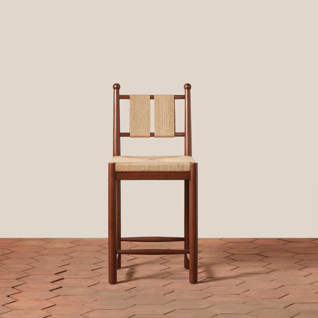 Estela Counter Stool in warm brown wood with woven rush seat and Danish cord back