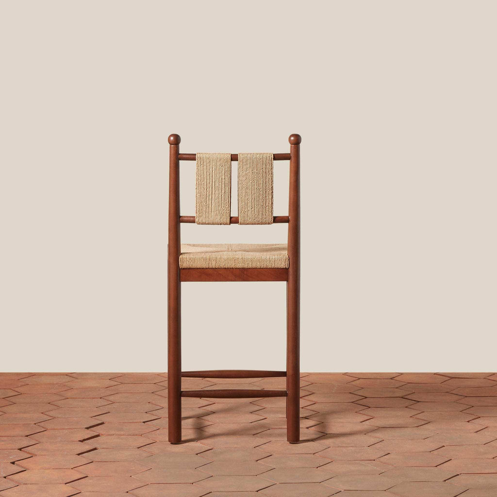 Estela Counter Stool in warm brown wood with woven rush seat and Danish cord back